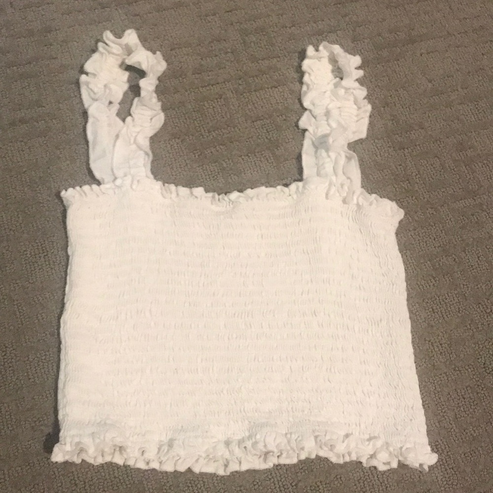 Cropped white frilly top